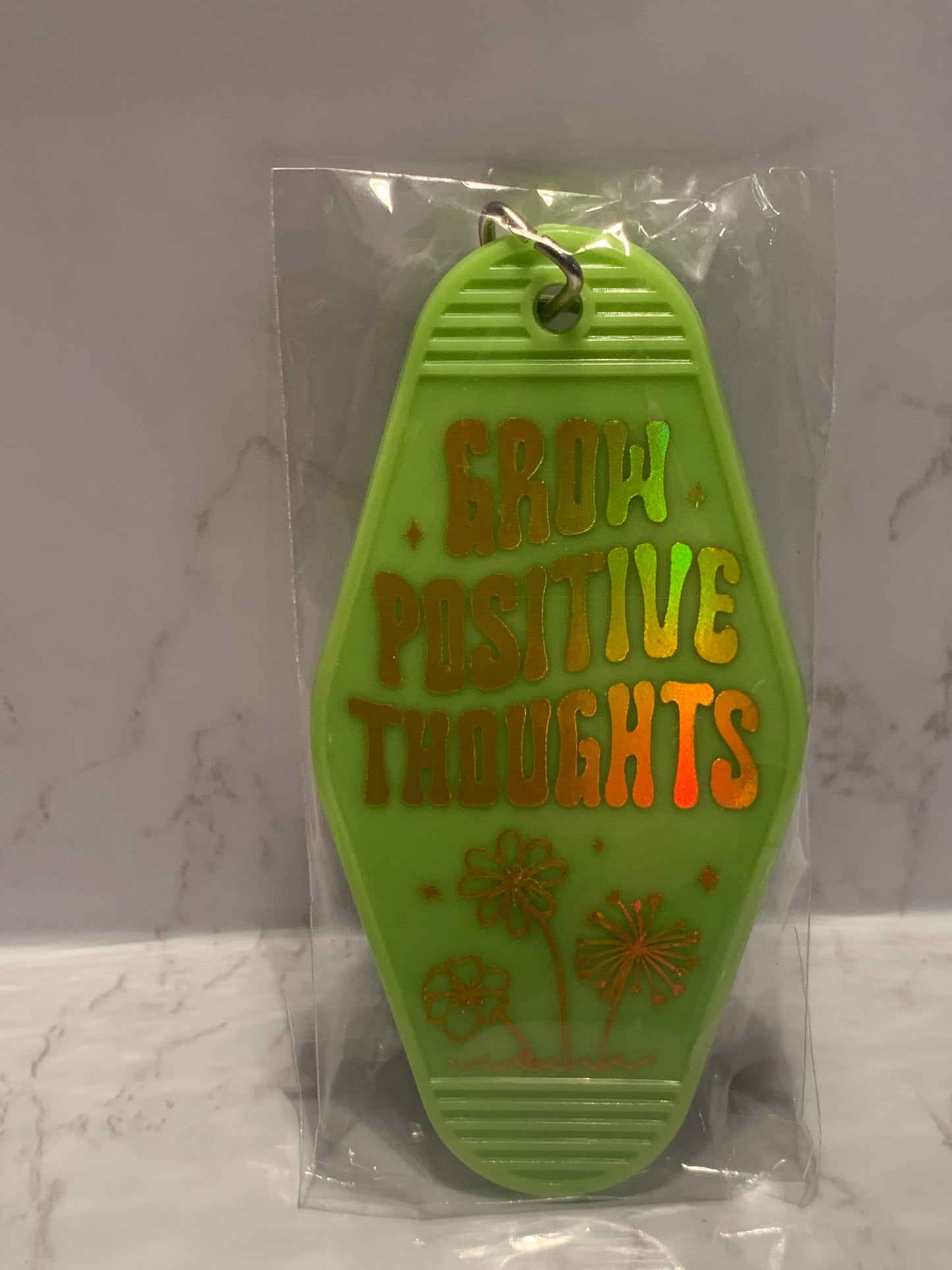 “Grow positive thoughts” classic motel style keychain